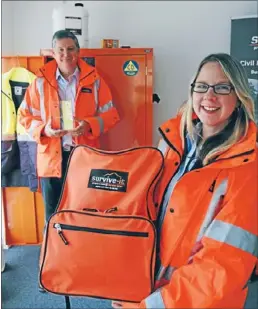  ??  ?? Well prepared: Enjoying the rapid growth of their company are Survive-it managing director Rod Hall and sales account manager Tracey Lever.