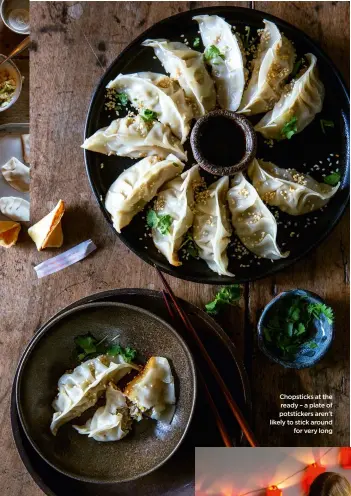  ??  ?? Chopsticks at the ready – a plate of potsticker­s aren't likely to stick around for very long