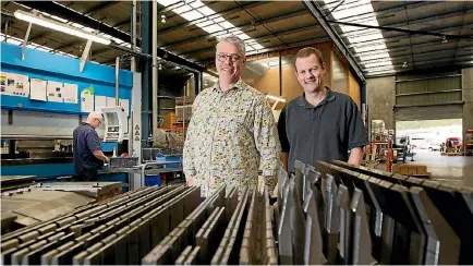  ?? PHOTO: ROSS GIBLIN\STUFF ?? Metco Engineerin­g owners Paul Jessup, left and Brent Greer in their Lower Hutt factory.