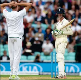  ??  ?? BIG BREAK: Keaton Jennings incurs the wrath — and disbelief — of South African bowler Morne Morkel after another lucky escape for the batsman