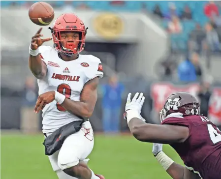  ??  ?? Louisville quarterbac­k Lamar Jackson might be the most intriguing case study yet in determinin­g the value of being a mobile quarterbac­k in the NFL?