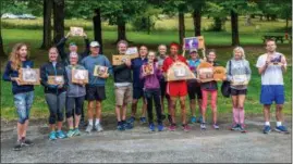  ?? DOUG FREESE PHOTO ?? The award winners show off their trophies at the recent Barry Hopkins Run at the Olana State Historic Site in Greenport, N.Y.