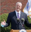  ?? STuART CAHiLL / HERALd STAFF ?? ON HIS OWN: Gov. Charlie Baker ignored unions’ offers to help get essential workers vaccinated.