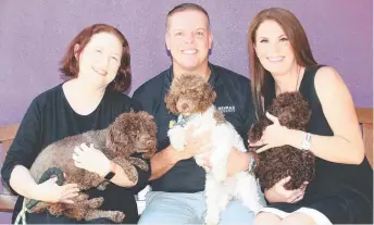  ?? P ?? AWLQ CEO Katie Garrett with Ben and Andrea Williams from Remax Regency and dogs Devo, Gaston and Javier from the animal shelter. Proceeds from the sale of the property (below) in Strathpine p will be donated to the AWLQ. Q Picture: Glenn Hampson.