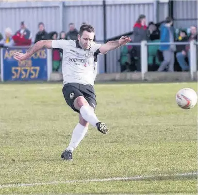  ??  ?? Goals from co-player-manager Kev Towey ( left)