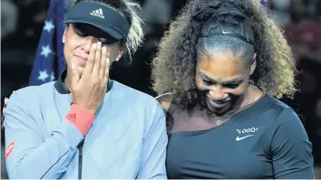  ??  ?? EMOTIONAL ROLLERCOAS­TER Osaka, left, in tears after a match in which Serena and Ramos clashed
