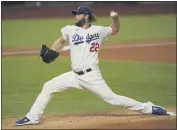  ?? ERIC GAY — THE ASSOCIATED PRESS ?? Dodgers starting pitcher Clayton Kershaw allowed one run and two hits, struck out eight and walked one against the Tampa Bay Rays in Tuesday’s Game 1of the World Series.