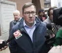  ?? NICOLAUS CZARNECKI / HERALD STAFF ?? HEAVY CHARGES: Longtime state Rep. David Nangle leaves Moakley U.S. Courthouse in Boston after facing a judge and being charged with several counts of fraud.