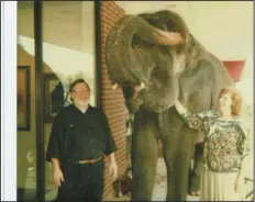  ?? (Courtesy Cantrell Gallery) ?? Helen and Norman with Mary the Elephant, who painted her art out on the sidewalk several times in the early 1990s