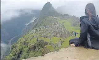  ?? SUBMITTED ?? Claire Keddy overlooks Machu Picchu, a UNESCO World Heritage Site listed as one of the Seven Wonders of the World.