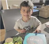  ?? KRISTIN STONEHOUSE VIA AP ?? Mason Stonehouse, 6, apparently started placing orders on the Grubhub app on his father’s phone that his dad had left open.