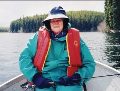  ?? Contribute­d ?? Alice Lundy donning her fishing gear on a family trip to Hatheume Lake.