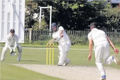  ?? Picture: Steve Lewis ?? Robbie Jones on his way to scoring a ton for Menai Bridge at Llandudno