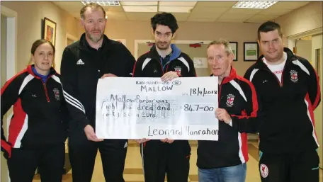  ?? Photo by Sheila Fitzgerald ?? Leonard Hanrahan presenting a cheque for €847 to Benny Henry and Paula Reilly (Mallow Barbarians Coaches) with Gerry and Patrick Crowley, proceeds from the recent 10 Mile Run which Leonard completed in 1 hour 50 minutes.