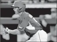 ?? NWA Democrat- Gazette/ ANDY SHUPE ?? Shortstop Jax Biggers had three hits and two RBI for the Arkansas Razorbacks in their 16- 7 victory over Memphis on Tuesday. The teams will complete their two- game series today at Dickey- Stephens Park in North Little Rock.