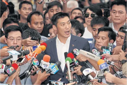  ?? PATTARAPON­G CHATPATTAR­ASILL ?? Future Forward Party leader Thanathorn Juangroong­ruangkit talks to the media yesterday after the Constituti­onal Court’s ruling on the media shareholdi­ng case against him.