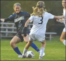  ?? Staff photo/ Jake Dowling ?? St. Marys’ Kendall Dieringer ( 6) battles for the ball during Monday’s girls soccer match.