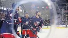  ?? [TOM DODGE/DISPATCH] ?? The Blue Jackets’ Nick Foligno, right, celebrates his firstperio­d goal.