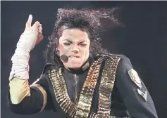  ??  ?? Jackson performs during a concert in Sao Paulo, Brazil, on Oct 15, 1993. — File photo