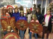  ??  ?? Dutchess Day School students wearing appropriat­e attire for Gladiator School during their trip to Italy. Back row, from left: Brandon Cooke, 7, Jake Buch, 8, Jake Rohan, 7, Leah Colby, 6, Minali Abraham-Aggarwal, 8, Patrick Murphy, 8, Hana Elmousely,...