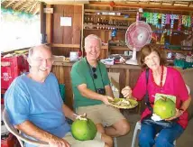  ??  ?? The author and Paulette and Gary Hay enjoy lechon and buco along the Baler-Casiguran road in Aurora.