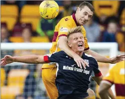  ??  ?? STALEMATE: Motherwell’s McManus and Dundee’s O’Hara do battle