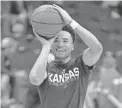  ?? DENNY MEDLEY/USA TODAY SPORTS ?? Kansas guard Devon Dotson warms up before a game at Allen Fieldhouse in Lawrence, Kansas, on Feb. 24.