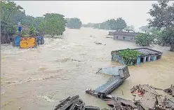  ?? PTI ?? Flood wreaks havoc in Bihar’s Gopalganj district on Monday. n