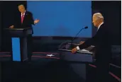  ?? MORRY GASH – THE ASSOCIATED PRESS ?? President Donald Trump gestures toward Democratic presidenti­al candidate former Vice President Joe Biden during the second and final presidenti­al debate Thursday.