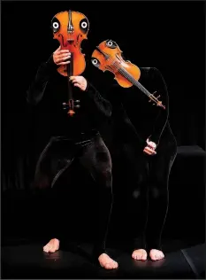  ?? Courtesy photo ?? The new Mummenscha­nz “you&me,” coming to the Walton Arts Center on Feb. 27, includes a love affair between a violin and a viola.