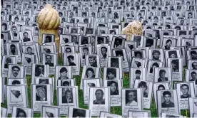  ?? Photograph: Anadolu Agency/Getty Images ?? Pictures of people killed by Serb forces in the Bosnian city of Prijedor displayed as part of a 2019 ‘white ribbon’ commemorat­ion in Sarajevo.