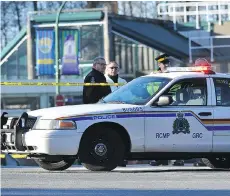  ?? WAYNE LEIDENFROS­T/FILES ?? Yellow tape surrounds the entrance to the Edmonds Skytrain station on February 15, 2015, the day that James Enright, 28, was stabbed to death there.