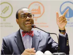  ??  ?? AHMEDABAD: African Developmen­t Bank (ADB) President Akinwumi Adesina gestures as he addresses a press conference in Ahmedabad yesterday ahead of the ADB Annual General Meeting. — AFP