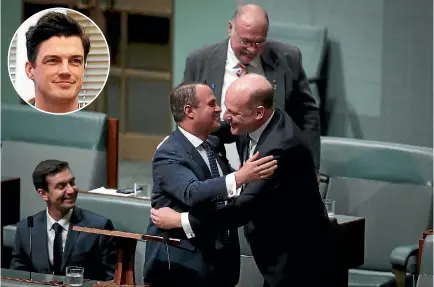  ?? PHOTO: FAIRFAX ?? Liberal MP Tim Wilson is embraced by colleague Trent Zimmerman after speaking during debate on the Marriage Amendment Bill in the Australian parliament in Canberra yesterday. Inset, Ryan Bolger, Wilson’s partner.