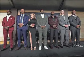  ?? ?? The Pro Football Hall of Fame Class of 2024 inductees, from left: Patrick Willis, Julius Peppers, Misty McMichael (representi­ng Steve McMichael), Andre Johnson, Devin Hester, Randy Gradishar and Dwight Freeney.