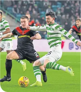  ??  ?? Oliver Burke crosses under pressure from Airdrie’s Chris O’neil