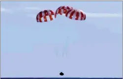  ?? NASA VIA THE ASSOCIATED PRESS ?? The Orion capsule returns to Earth on Sunday in the Pacific off Mexico.