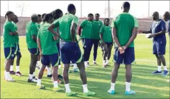  ?? ?? Finidi George (right) addressing Super Eagles after training in Marrakech, Morocco...yesterday