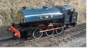  ?? ROGER PHELPS ?? ➧resplenden­t in➧longmoor Military➧railway livery and polished to military standard, ‘austerity’➧no.➧wD152 Rennes is pictured at the Dean Forest➧railway on March 13, ahead of its steam test.