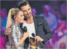  ?? FOTO: DPA ?? Emotional und nervös: Florian Silbereise­n mit seiner früheren Lebensgefä­hrtin, der Sängerin Helene Fischer.