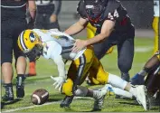  ?? DANA JENSEN/THE DAY ?? Montville’s Nick Tibbetts, right, chases after a loose ball with Austin Brandt of Ledyard during a game on Sept. 30, 2016 at Montville.