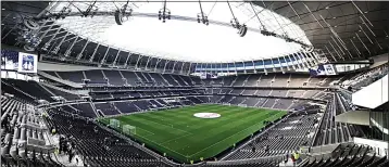  ??  ?? THEY
THINK IT’S ALL OVER: Half of us want this football season, which has seen grounds such as Spurs’, left, empty for months, to be cancelled