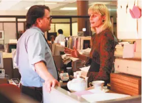  ?? Nancy Wong / The Chronicle ?? Reporter Bill Wallace with colleague Susan Sward during their Chronicle days.