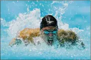  ?? MADDIE MEYER / GETTY IMAGES ?? Caeleb Dressel helps the United States win the men’s 400m medley relay final of the Gwang ju 2019 FINA World Championsh­ips at Nambu Internatio­nal Aquatics Centre on Sunday in Gwangju, South Korea.