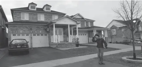  ?? BRETT GUNDLOCK/ POSTMEDIA NEWS FILES ?? The Markham, Ont., home where Huei Hann Pan was shot and wife Bich Ha Pan was killed in 2010. Their daughter Jennifer is on trial for murder.