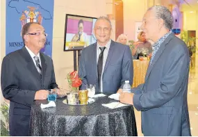  ??  ?? From left: Clark Lobbon, general manager of Holiday Inn in Montego Bay; William Massias, chief executive officer of Brawta Living in Kingston; and Wayne Habib of the Cardiff Hotel and Spa in Runaway Bay, St Ann, chatting during the Tourism Service Excellence Awards 2018.