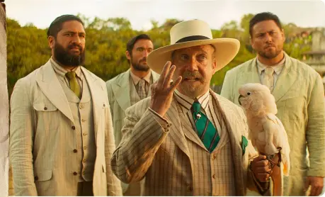  ??  ?? BIRD IN THE HAND
Paul Giamatti is Nilo, Frank’s arch-enemy trying to take down his business (above). TO BE BLUNT…
Jack Whitehall and Emily Blunt play siblings McGregor and Lily Houghton (opposite, middle). JUNGLE BOOGIE
Director Jaume Collet-Serra with Johnson (opposite).