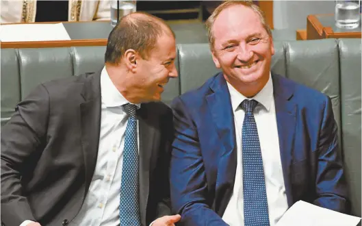  ??  ?? Environmen­t Minister Josh Frydenberg and Deputy Prime Minister Barnaby Joyce.