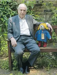  ?? SANG TAN / THE ASSOCIATED PRESS FILES ?? Author Michael Bond, creator of globe-trotting duffelcoat­ed teddy Paddington bear, is pictured in 2008. The Paddington books have sold some 35 million copies worldwide and have been translated into 40 languages.