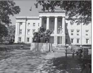  ??  ?? The grounds of the North Carolina Capitol building offer a quiet resting spot in the center of downtown.